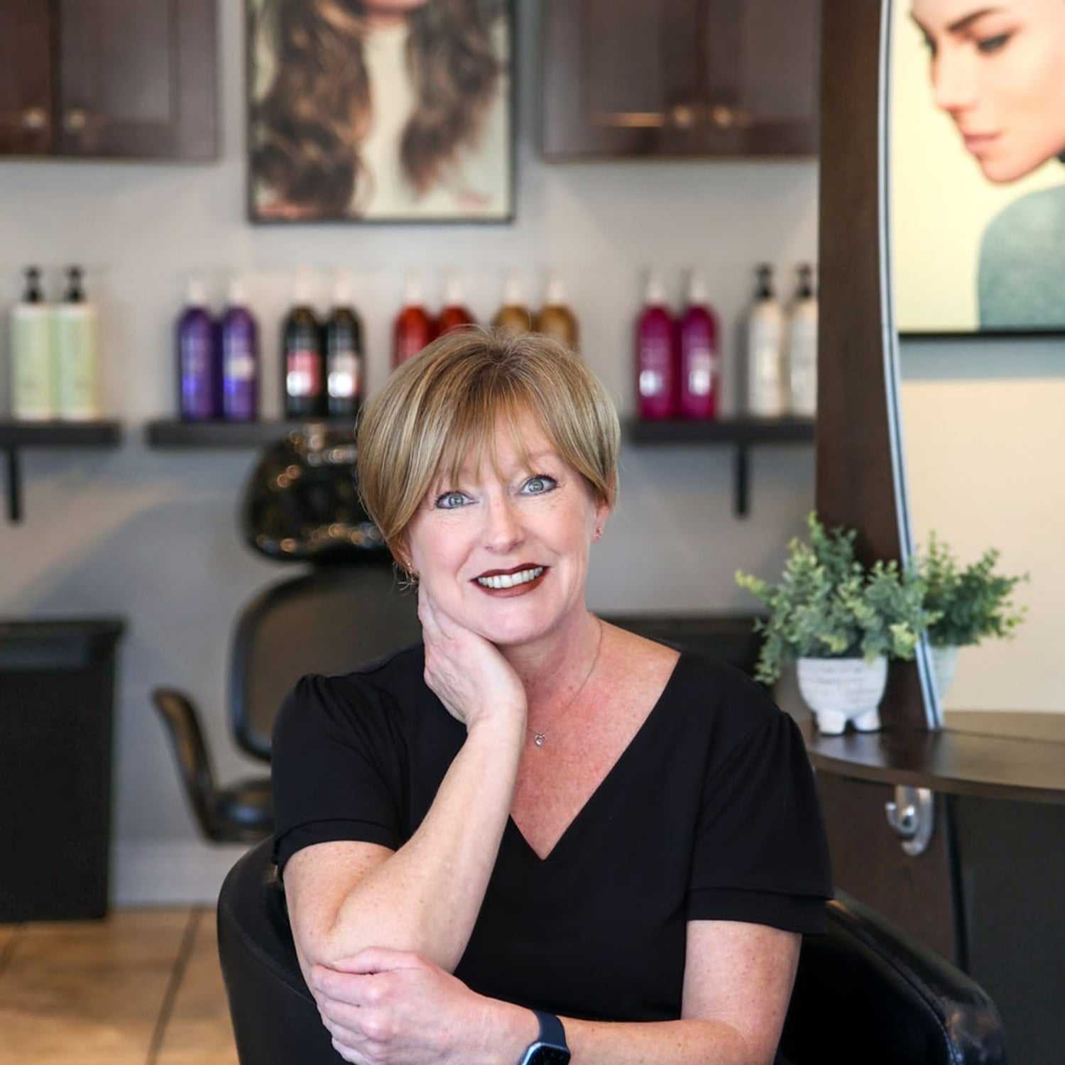 Portrait of Jennifer Thomas, a professional stylist at Juliana's Salon, showcasing their expertise and style.