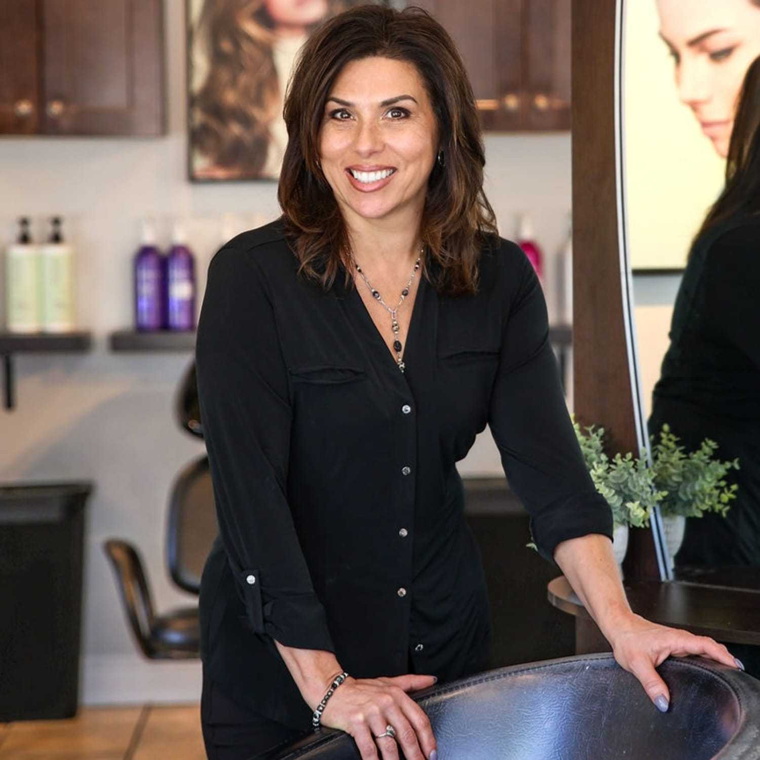 Portrait of Juliana Capillo, a professional stylist at Juliana's Salon, showcasing their expertise and style.