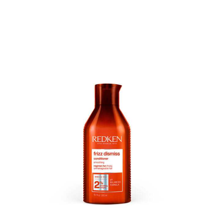 Red bottle of Redken Frizz Dismiss conditioner for frizzy hair, 250 ml size.