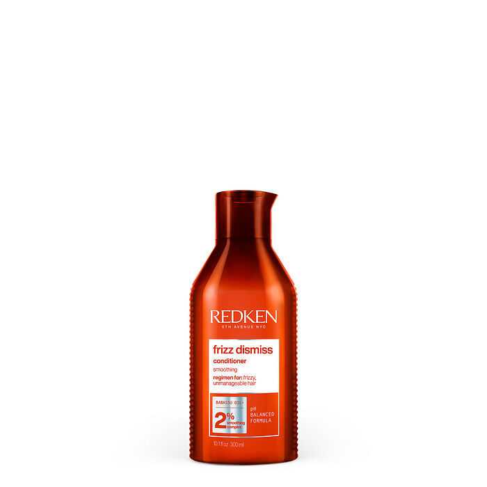 Red bottle of Redken Frizz Dismiss conditioner for frizzy hair, 250 ml size.